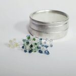 12 CONTAINERS OF 12 GLASS FLOWER FILTERS, TOTAL 144 FILTERS
