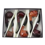 DISPLAY OF 6 RESIN WOOD PIPES.  THE REFINED CLASSIC COLLECTION