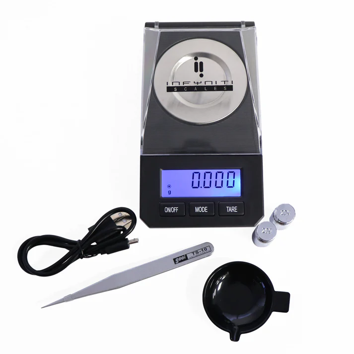 in-50---set INFYNITI 50 GRAM TRIPLE DIGIT INFINITE SCALE, WITH 2 20 G WEIGHTS AND TWEEZERS - Image 1